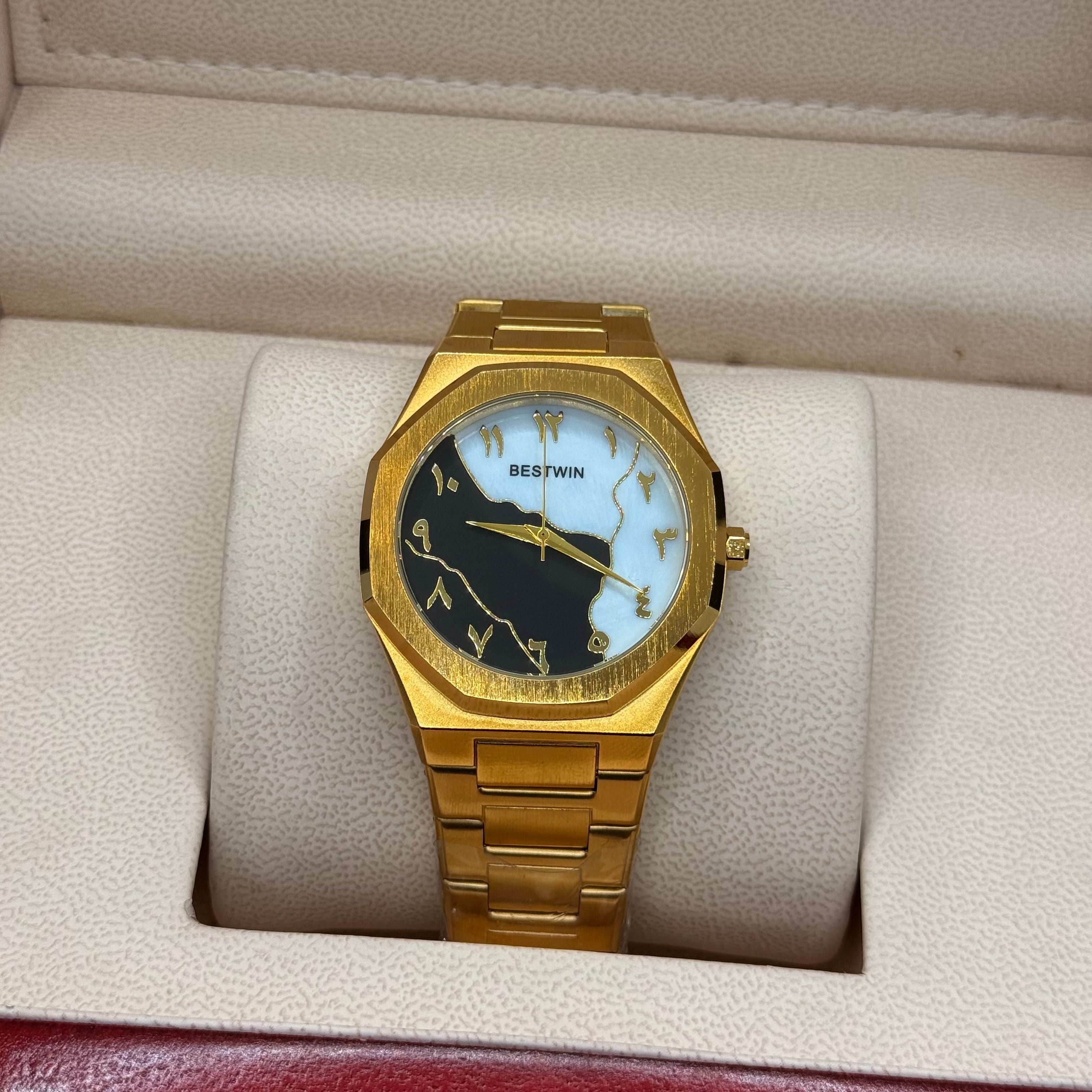 Aura stain less steel golden with marble dial